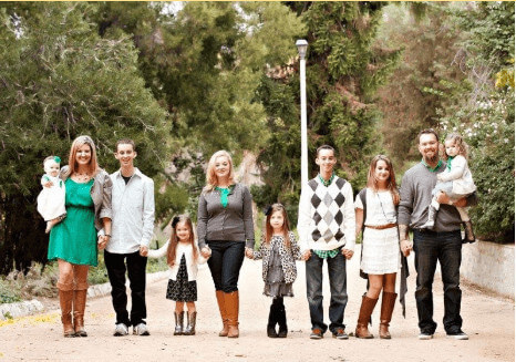 Emma, with her parents and siblings